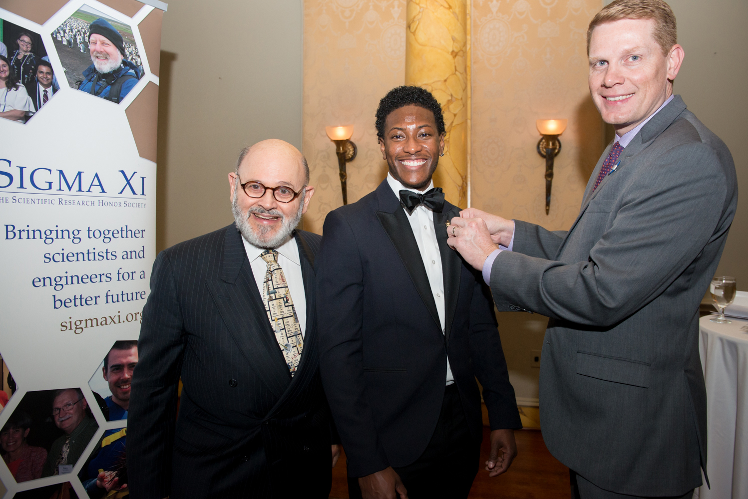 Carter_receiving_lapelpin