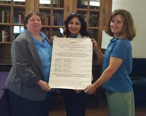 Karen Mitchell, Eman Ghanem, Tina Gouin Paul with charter